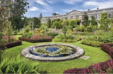  ??  ?? CLOCKWISE FROM TOP
Mount Stewart’s magnificen­t gardens were designed by Edith, Lady Londonderr­y after the First World War; built between 1413 and 1441, Kilclief Castle was one of the first tower houses in the county; the sheltered waters of Strangford Lough are a perfect nursery for breeding grey seals