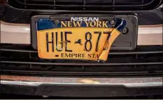  ?? Hilary Swift / New York Times ?? A candidate for repair found on Gersh Kuntzman’s afternoon license plate-fixing expedition in Brooklyn on Dec. 7.