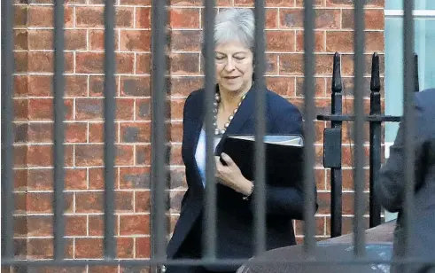  ?? Photo / AP ?? Theresa May was to meet with her Cabinet this morning to try to win approval for the draft deal.