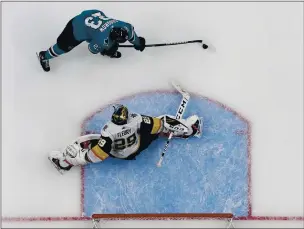  ?? NHAT V. MEYER — BAY AREA NEWS GROUP ?? San Jose Sharks’ Barclay Goodrow (23) scores the game winning goal against Vegas Golden Knights goaltender Marc-Andre Fleury (29) in the overtime period of Game 7 of an NHL first round playoff series at the SAP Center in San Jose, on April 23, 2019.