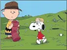 ??  ?? Charile and Snoopy play golf
