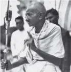  ?? The Associated Press ?? E In this photo dated 1931, Mahatma Gandhi talks to a crowd in India. The Indian independen­ce leader, who is considered one of history’s great champions of nonviolent struggle, was nominated for the Nobel Peace Prize five times but never won.