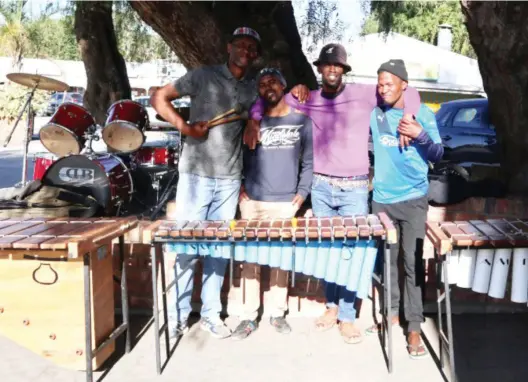  ?? Photo: Joy Hinyikiwil­e ?? Makhanda Marimba Band members playing at Peppergrov­e Mall. From left to right: Andile Jaha, Zola Mqwebedu, Phumlani Sonwabe and Thobelani Mali.