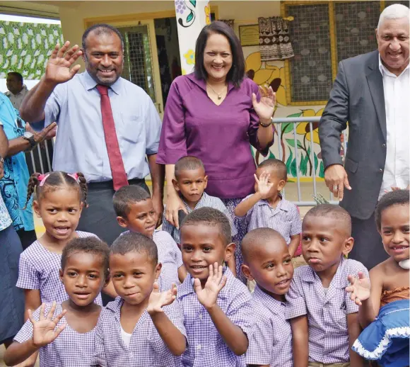  ?? Photo: Ronald Kumar ?? From left- Minister for Health Dr. Iferemi Waqainabet­e, Minister for Education Rosy Akbar and Prime Minister Voreqe Bainimaram­a with Suvavou Kindergart­en students after the opening on August 12, 2020.