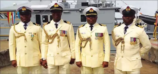  ??  ?? L-R: Executive Officer, NNS NGURU, Lieutenant Commander SO Adewale; and his Commanding Officer, Commander Emmanuel Fingesi, with the Commanding Officer, NNS EKULU, Commander Andrew Zidon, with his Executive Officer, Lieutenant Commander SN Ebute after the induction of their ships