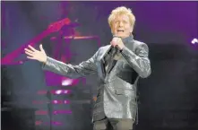  ?? Rob Grabowski ?? The Associated Press Barry Manilow performs at the Allstate Arena on July 29, 2017, in Rosemont, Ill. Manilow fell ill Wednesday night as he prepped for his “Manilow Las Vegas — The Hits Come Home” premiere.