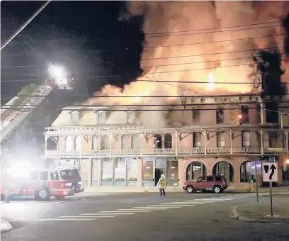  ?? DAN JERRAM/COURTESY ?? A three-alarm fire broke out at a historic structure in the center of New Hartford early Tuesday morning. Between 75 and 100 first responders were called in from 31 department­s across Litchfield County to assist in fighting the blaze.