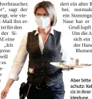  ?? FOTO: STEFAN AREND ?? Aber bitte mit Mundschutz: Kellnerin Vera Cacic in ihrer neuen Arbeitskle­idung.