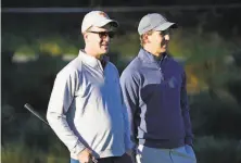  ?? Tony Avelar / Associated Press ?? Peyton Manning (left) and brother Eli compete on the Spyglass Course at the AT&T Pebble Beach National ProAm on Feb. 6.