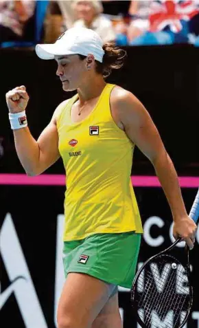  ?? AFP PIC ?? Australia’s Ashleigh Barty celebrates after beating Caroline Garcia of France on day one of the Fed Cup final in Perth yesterday.