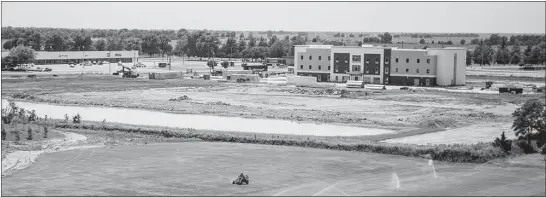  ?? PHOTOS BY ANDREA MORALES / THE NEW YORK TIMES ?? A view of the work site in Cleveland, Miss., where a Scion hotel will open. The Trump Organizati­on has struck just one new hotel deal since the president took office. It’s with two brothers doing business in rural Mississipp­i.