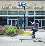  ?? SUBMITTED PHOTOS ?? Searcy native Sean Musser shows off his skills skateboard­ing in front of the Main Street branch of First Community Bank during the All Hands on Deck event.