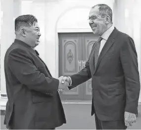  ?? RUSSIAN FOREIGN MINISTRY PRESS SERVICE TELEGRAM CHANNEL VIA AP Professor of internatio­nal studies at Ewha University ?? North Korean leader Kim Jong Un and Russian Foreign Minister Sergey Lavrov meet Thursday. Lavrov arrived in the North Korean capital, Pyongyang, Wednesday.