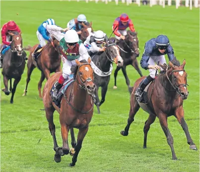  ?? Picture: PA. ?? Frankie Dettori celebrates after Without Parole crosses the line to win the St James’s Palace Stakes.