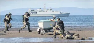  ??  ?? Display
The controvers­ial beach assault staged by Royal Marine Commandos