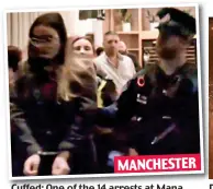  ?? ?? MANCHESTER
Cuffed: One of the 14 arrests at Mana