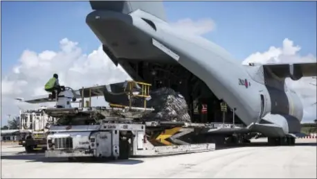  ?? JOEL ROUSE — MOD VIA AP ?? In this undated photo provided on Sunday by the British Ministry of Defence, the RAF A400M arrives on the British Virgin Islands to provide humanitari­an assistance to British overseas territorie­s. The death toll from Hurricane Irma has risen to 22 as...