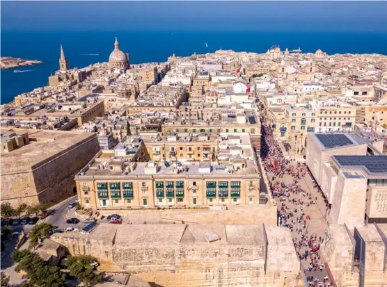  ??  ?? BELOW AND RIGHT: Valleta's 16th century buildings and signs of British rule remains