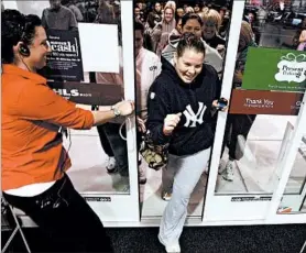  ?? GREG KAHN/AP ?? Shoppers enter the door at a Kohl’s department store in Naples at 4 a.m. on Black Friday in 2008. This year, Kohl’s will open at 5 p.m. Thanksgivi­ng Day, an hour earlier than last year.