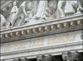  ?? ASSOCIATED PRESS ?? In this Nov. 23 file photo, stone sculptures adorn the New York Stock Exchange.