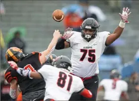  ?? Steph Chambers/Post-Gazette ?? Solvauhn Moreland (No. 75) is one of three 300-pound defensive linemen for the Aliquippa Quips.