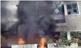  ?? — BY ARRANGEMEN­T ?? The residence of AP transport minister Pinepe Viswaroop set ablaze by protesters in Amalapuram in Konaseema district on Tuesday.