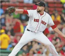  ?? STAFF PHOTO BY MATT WEST ?? GOOD SPOT: Brian Johnson pitched four innings last night to help an injury-plagued Red Sox rotation in a 4-2 victory against the Angels at Fenway.