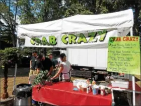  ?? LISA MITCHELL - DIGITAL FIRST MEDIA ?? Crab Crazy was one of the new vendors at the 21st annual Chile Pepper Food Festival in Bowers Sept. 9 and 10. There were a total of 95 vendors this year.