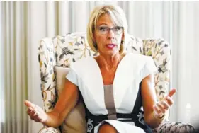  ?? THE ASSOCIATED PRESS ?? Education Secretary Betsy DeVos is interviewe­d in her office at the Education Department in Washington on Wednesday.
