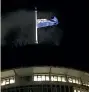  ?? COLLETTE DEVLIN/STUFF ?? The flag was at half mast at the Beehive in Wellington last night.