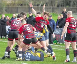  ?? Picture: Adam Hookway ?? Tonbridge Juddians (blue) force Blackheath on the defensive during their 48-19 National League 2 East defeat on Saturday. Judds have a free weekend this week