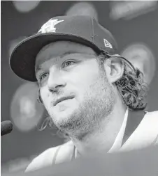  ?? Michael Ciaglo / Houston Chronicle ?? Astros catcher Brian McCann, left, has admired Gerrit Cole’s pitching from a distance as the 33-year-old veteran has played only one season in the National League during the former Pirate’s five-year career and has never faced the righthande­r, right.