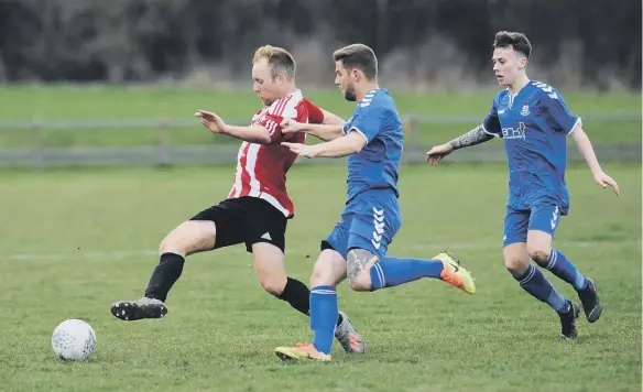  ??  ?? Sunderland West End (red/white) in action against Jarrow FC.