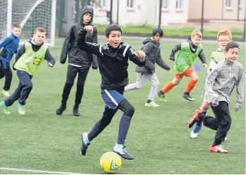  ??  ?? Action from this week’s Leisure and Culture Dundee’s football camps held at DISC. More pictures in Friday’s Evening Telegraph.
