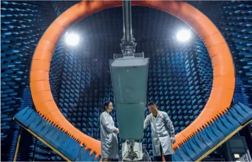  ??  ?? Engineers test equipment for 5G base stations at a Huawei lab in Guangzhou, Guangdong Province, on July 3, 2020