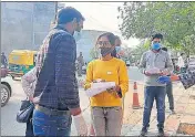  ?? DEEPAK GUPTA/HT PHOTO ?? Candidates of IIM CAT 2020 being checked at the entrance of an exam centre in Gomti Nagar extension, Lucknow, on Sunday.