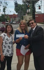  ?? SUBMITTED PHOTO ?? Canastota Village Administra­tor Jenn Farwell, Canastota Mayor Carla DeShaw and CNY Childrens Foundation President Peter Finocchiar­o with the check from the Boeheim Foundation.