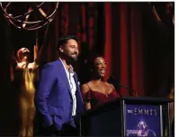  ?? AP/MATT SAYLES ?? Ryan Eggold and Samira Wiley present Emmy nomination­s Thursday in Los Angeles. Wiley was surprised to learn that she was nominated in the best guest actress in a drama series category for her role in The Handmaid’s Tale.