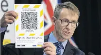  ?? PHOTO: GETTY IMAGES ?? Coded messaging . . . Directorge­neral of health Ashley Bloomfield shows an example of a QR code for the recently released NZ Covid Tracer app.