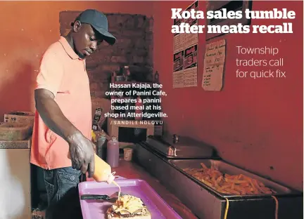  ?? / SANDILE NDLOVU ?? Hassan Kajaja, the owner of Panini Cafe, prepares a panini based meal at his shop in Atteridgev­ille.