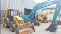  ??  ?? The constructi­on equipment section of the auction will feature items such as the JCB TLB (tractor-loader-backhoe) and Sunward excavator seen here.