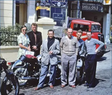  ?? ?? Driving force behind the creation of Nepean Raceway, Geoff Coombes (in cardigan), with fellow Australian­s Barry Hodgkinson on his right and Ron Sutcliffe on his left, with Bill Cooper far right. Keith Bryen’s wife Gwen is at the rear. The photo was taken by Keith Bryen at Douglas, Isle of Man in September 1956 where Coombes, Sutcliffe and Cooper formed a team in the Manx Grand Prix riding BSA Gold Stars.