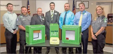  ?? Photo by Ryan Smith ?? In a partnershi­p between Polk Medical Center and the school district, each of the 10 county schools will receive an automated external defibrilla­tor and four EpiPens.