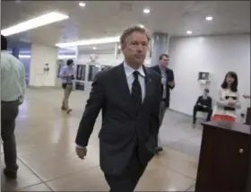  ?? J. SCOTT APPLEWHITE — THE ASSOCIATED PRESS ?? Sen. Rand Paul, R-Ky., walks to the Senate chamber for a vote, at the Capitol in Washington, Tuesday.