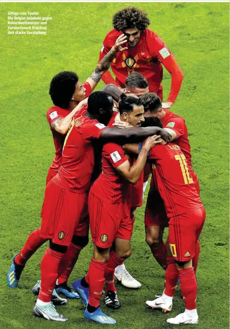  ??  ?? Giftige rote Teufel: Die Belgier bejubeln gegen Rekordwelt­meister und Turnierfav­orit Brasilien ihre starke Vorstellun­g