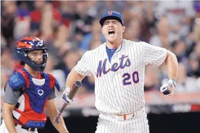  ?? TONY DEJAK/ASSOCIATED PRESS ?? New York Mets rookie Pete Alonso reacts during the Home Run Derby Monday in Cleveland. Alonso outslugged fellow rookie Vladimir Guerrero Jr. to win the contest.