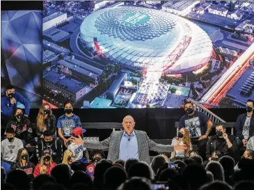  ?? RINGO H.W. CHIU/ ASSOCIATED PRESS ?? ▲ Clippers owner Steve Ballmer speaks during Friday’s groundbrea­king ceremony for the Intuit Dome in Inglewood, Calif. “We’re here to cheer, we’re here to win,” he said.