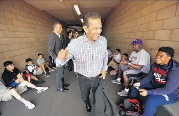  ?? Al Seib Los Angeles Times ?? EVEN before running for governor, Antonio Villaraigo­sa drew scrutiny for taking contributi­ons from groups accused of preying on the poor. Above, the former L.A. mayor gives a pep talk at Cathedral High School in 2017.