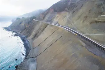  ?? Santiago Mejia / The Chronicle ?? The rebuilt highway, photograph­ed with a drone, is as much as 250 feet west of where it used to run, owing to the new land that was created with the slide that obliterate­d the road in May 2017.