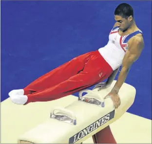  ?? Picture: PA ?? Louis Smith on the pommel horse at the World Championsh­ips.